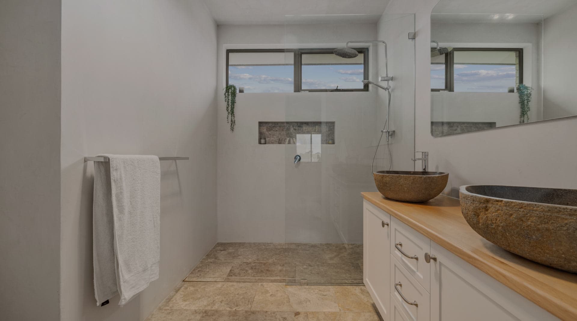 Modern bathroom renovation with custom tiling and fixtures