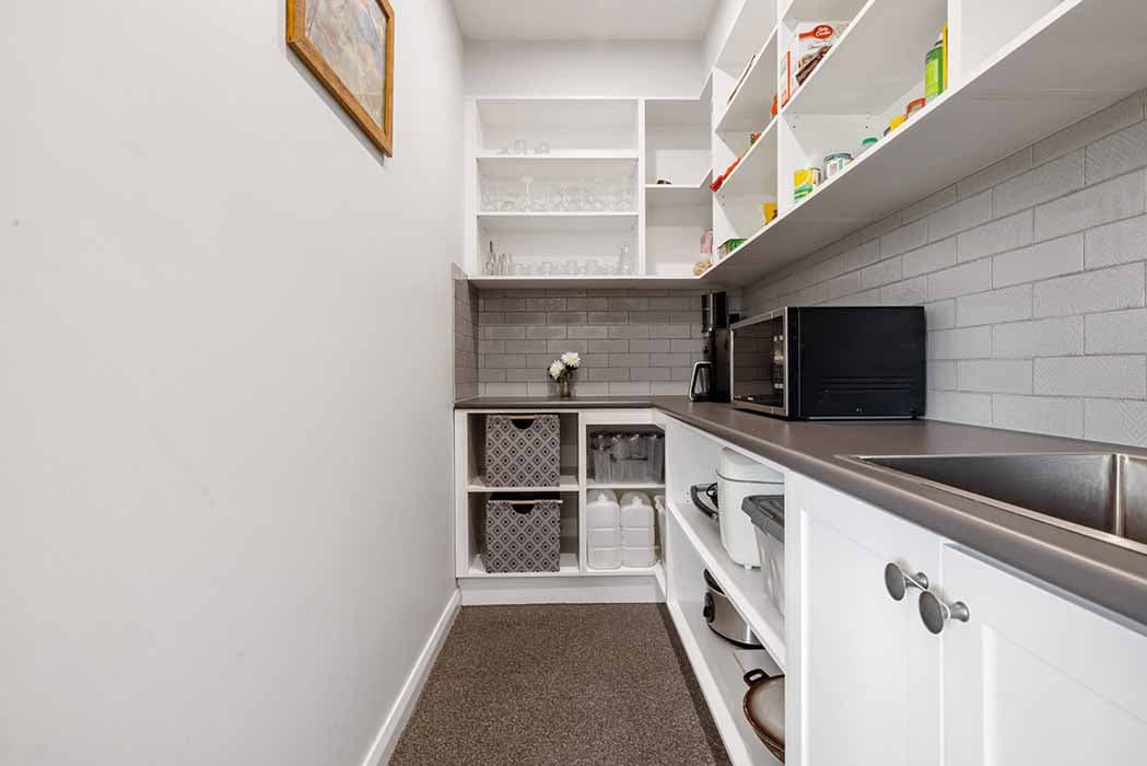Modern kitchen pantry renovation in Canberra, Australia with stylish storage solutions.