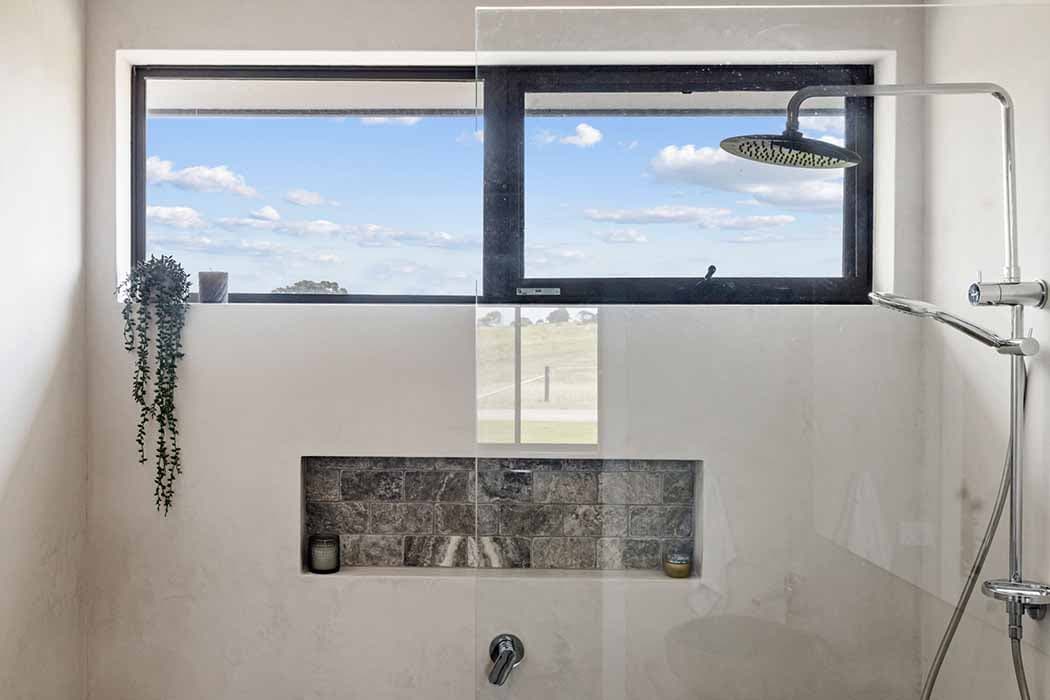 Modern shower design in Canberra, Australia with scenic views and stylish finishes.