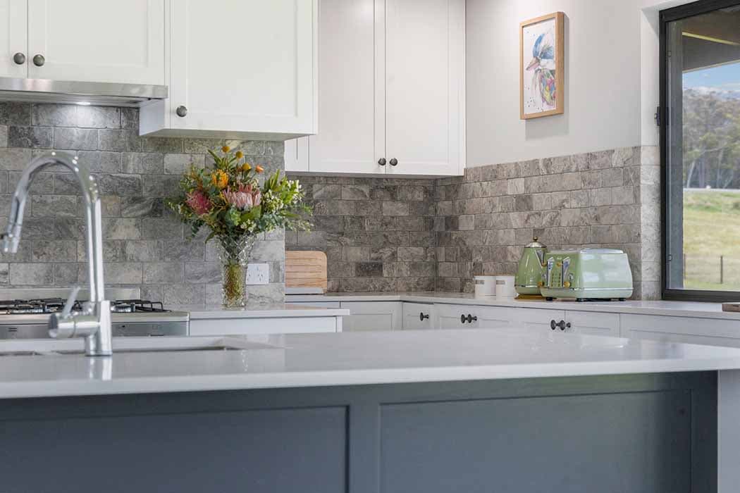 Modern kitchen renovation in Canberra, Australia with stylish finishes and natural light.