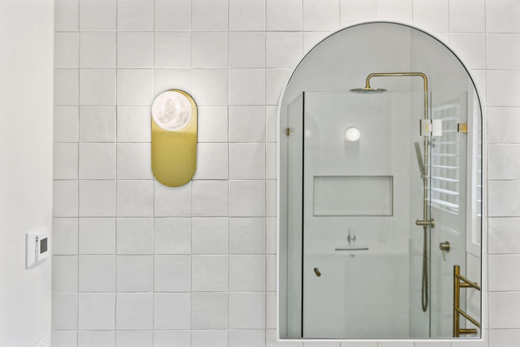 Modern bathroom renovation in Canberra with elegant fixtures and clean design.