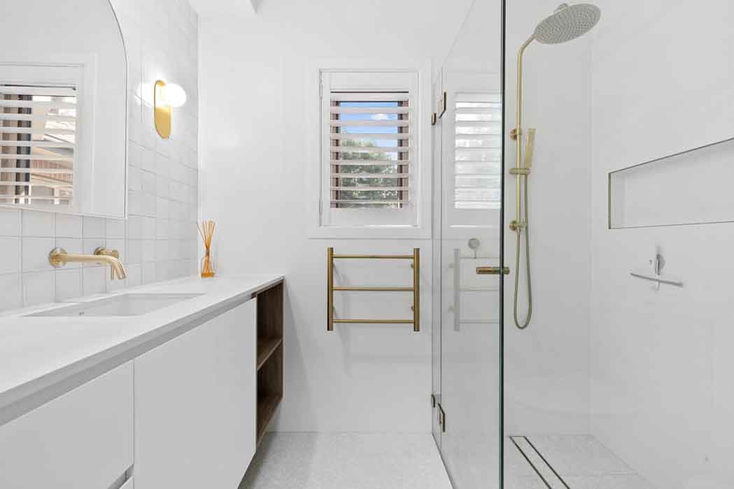 Modern bathroom renovation in Canberra, Australia with elegant finishes and spacious layout.