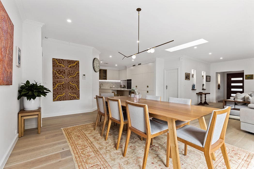 Modern dining area renovation in Canberra, Australia with stylish fixtures and open layout.