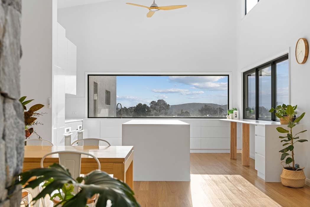 Modern kitchen renovation in Canberra with stunning views and sleek finishes.