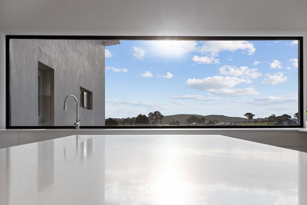 Modern kitchen with expansive window and stunning views in Canberra, Australia