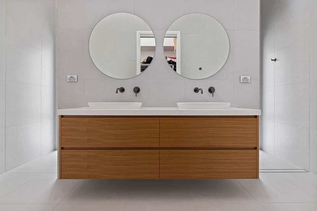 Modern bathroom renovation in Canberra with double vanity and stylish fixtures
