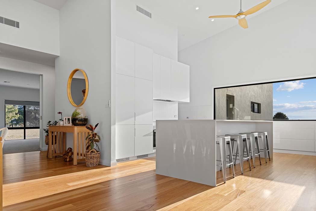 Modern kitchen renovation in Canberra, Australia with sleek finishes and natural light.
