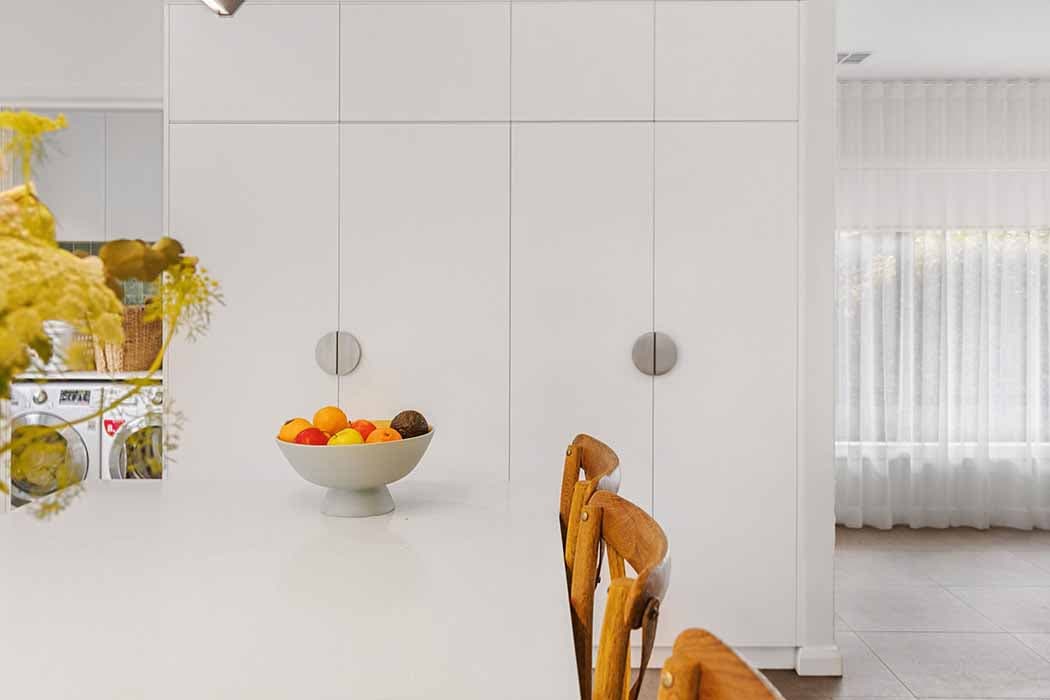 Modern kitchen renovation in Canberra, Australia with sleek cabinetry and bright design.