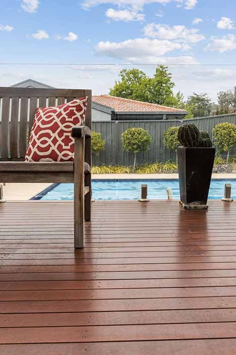 Stylish outdoor renovation in Canberra with wooden deck and pool