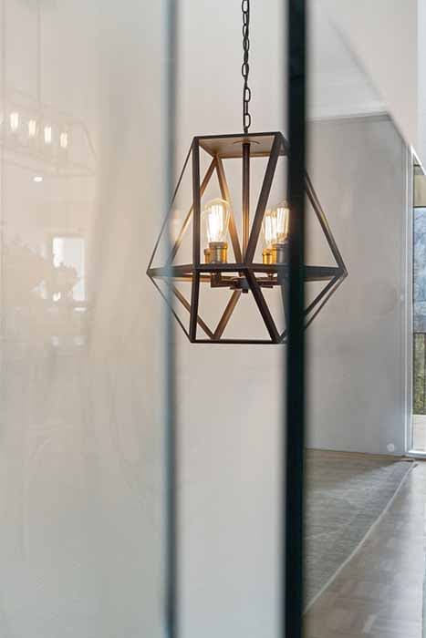 Modern geometric pendant light in a renovated Canberra home