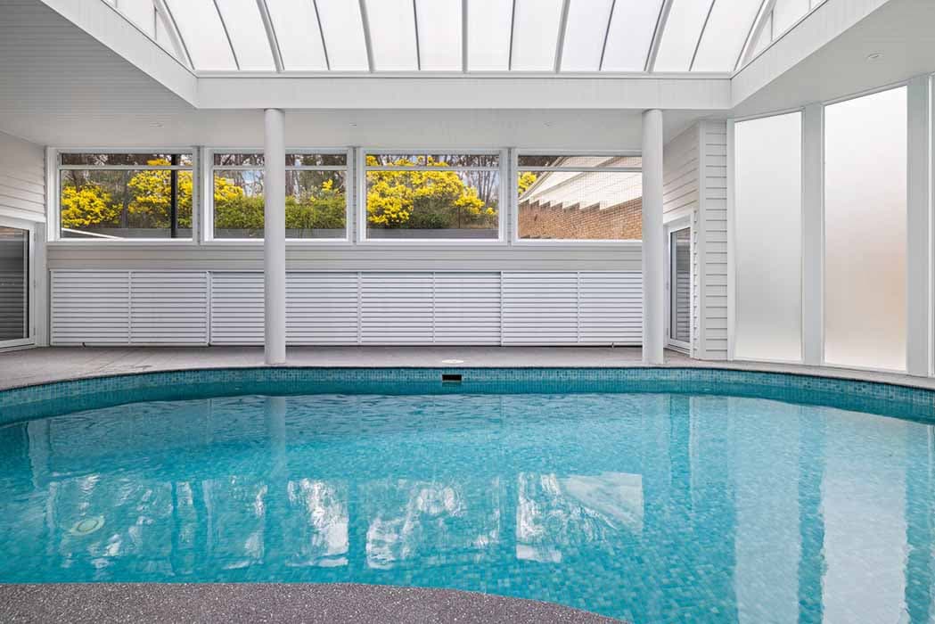 Indoor pool renovation in Canberra, Australia with modern design and natural light.