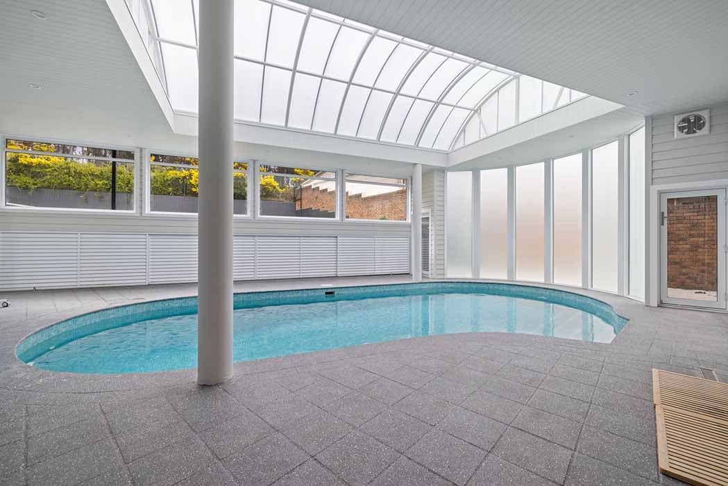 Indoor pool renovation in Canberra, Australia with modern design and natural light.