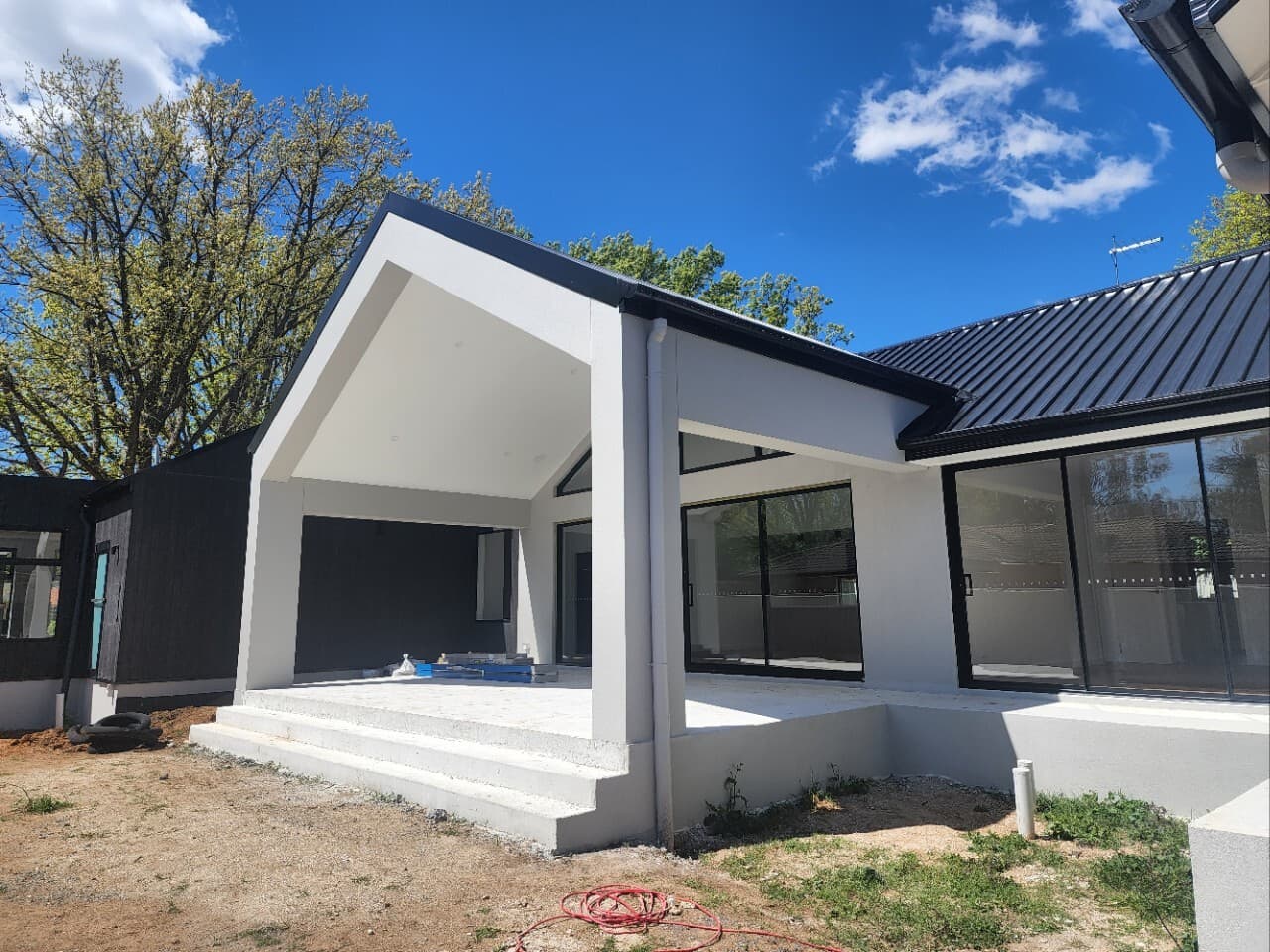 Modern home renovation in Canberra, Australia with stylish design and outdoor living space.