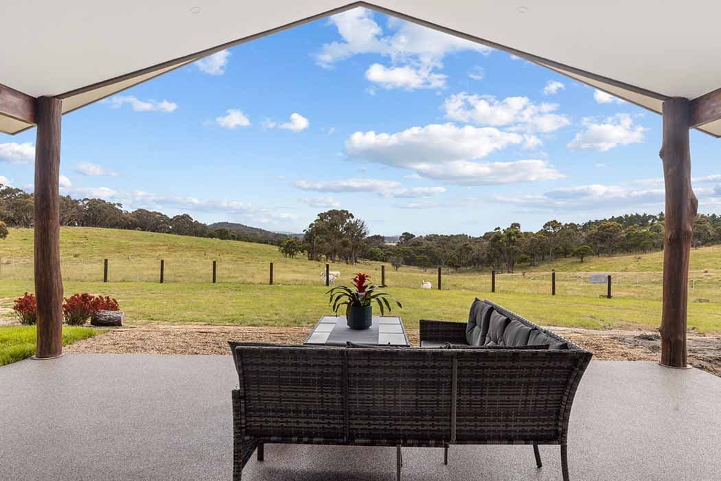 Stylish outdoor living space in Canberra, Australia with modern finishes and scenic views.
