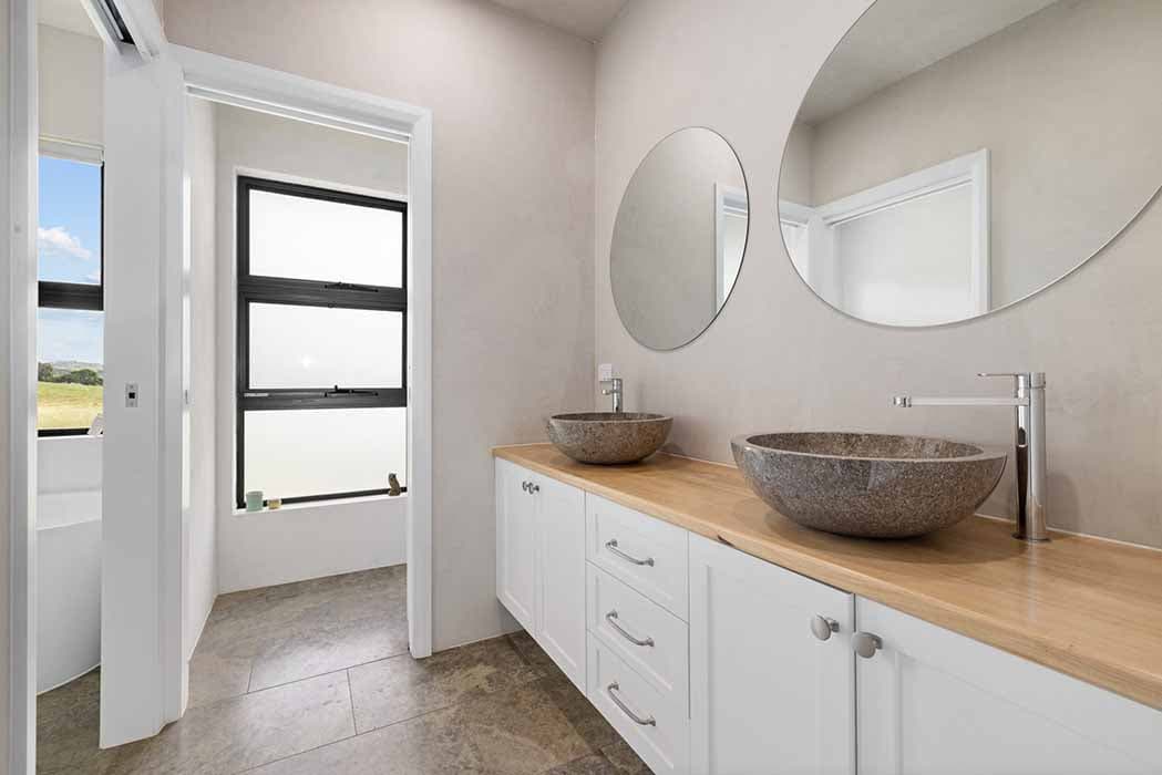 Modern bathroom renovation in Canberra, Australia with stylish finishes and natural light.